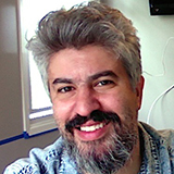 Headshot of Leonardo Claudino.