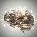 Brain surrounded by interconnected beams of light.